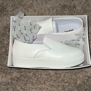 Platform white slip ons